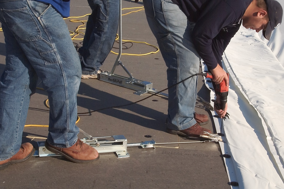 commercial roof being repaired